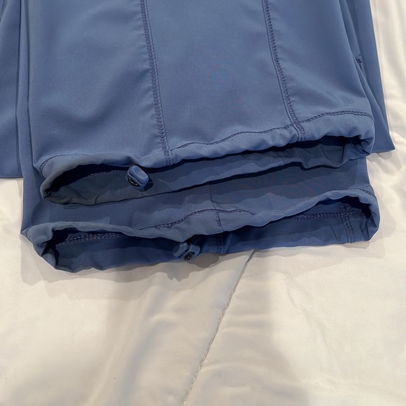 Pair of ceil blue scrubs, medium top and large bottom. See pictures for flaws. - Picture 10 of 11